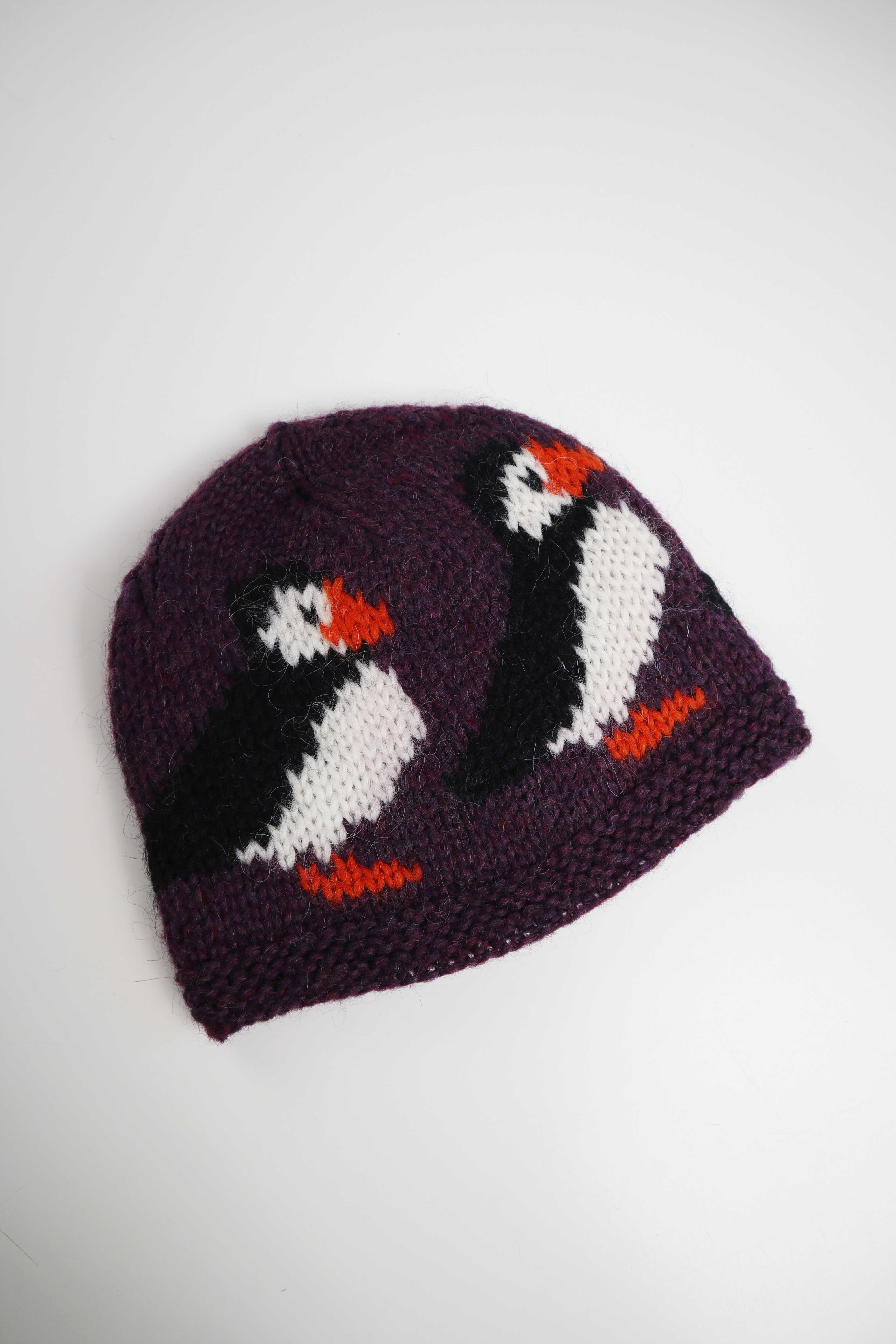 Handgestrickte Mütze in lila weiß Pinguine Merinowolle Wollmütze Flieder
