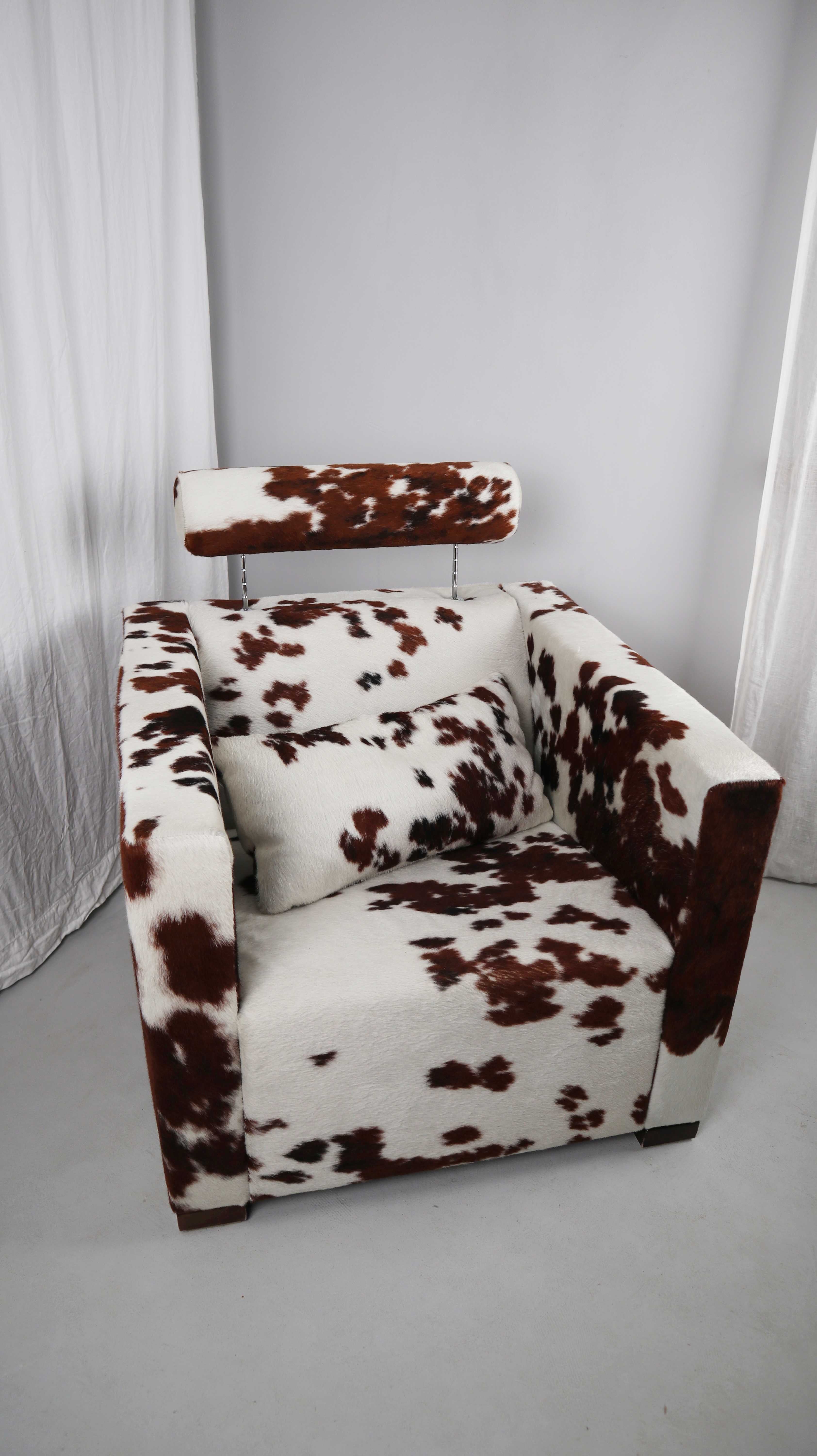 Gyform Sessel Kuhfellsessel braun weiß Kopflehnstütze Fellsessel Design Clubsessel
