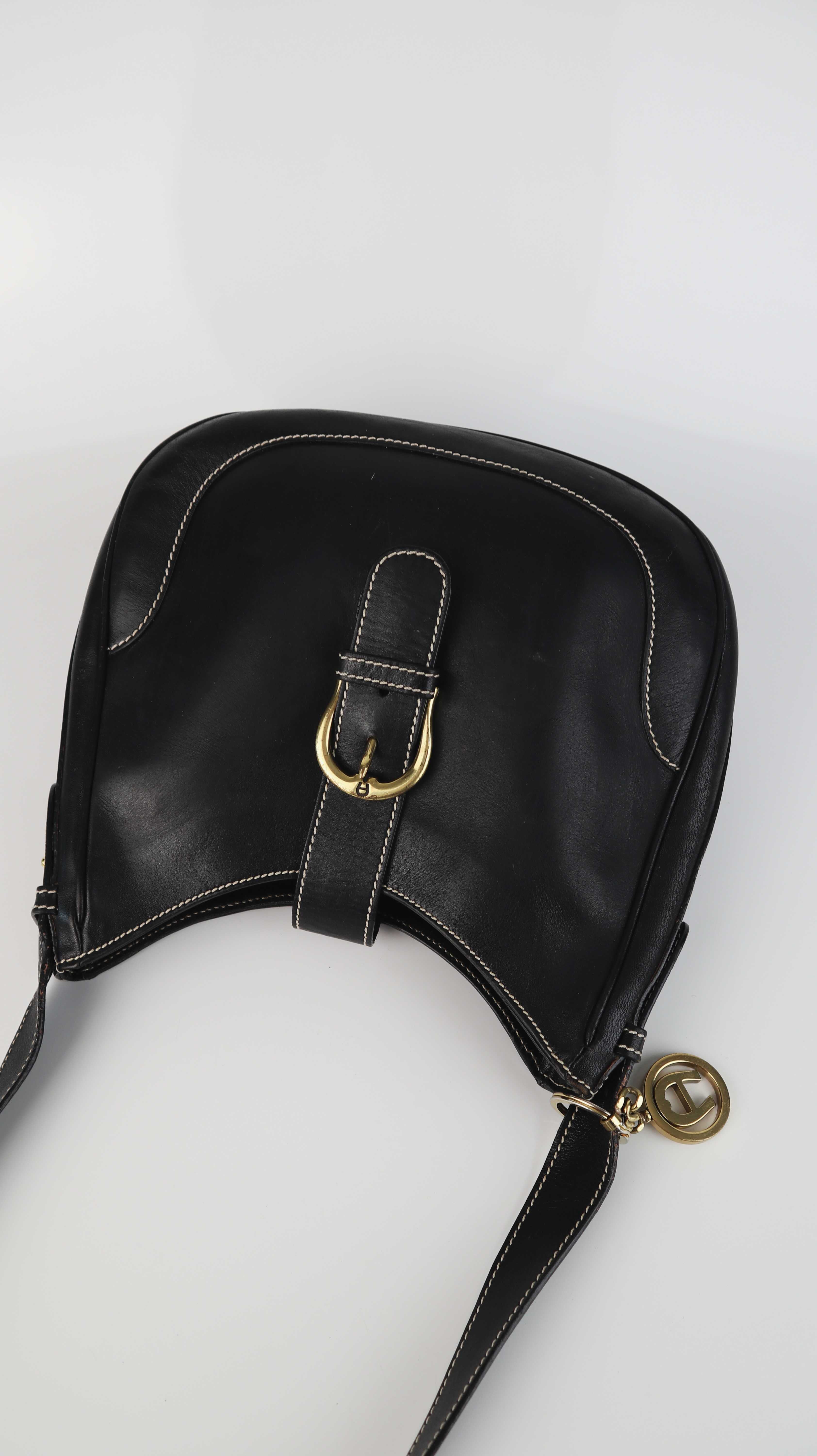 Aigner Tasche Leder schwarz Schultertasche Gold Hobotasche