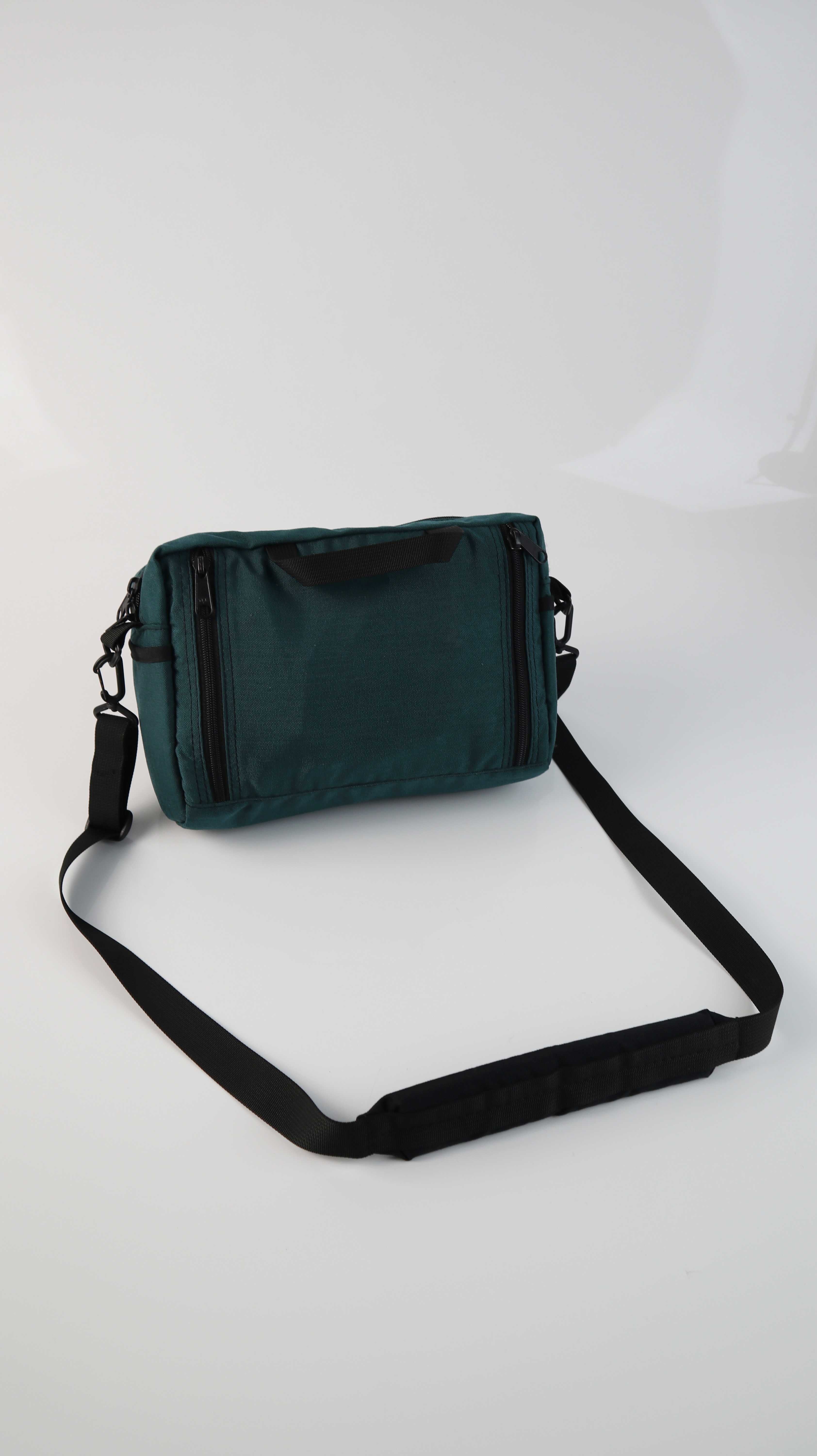 Eagle Creek Tasche Umhängetasche Petrol Hüfttasche Etui Reisetasche