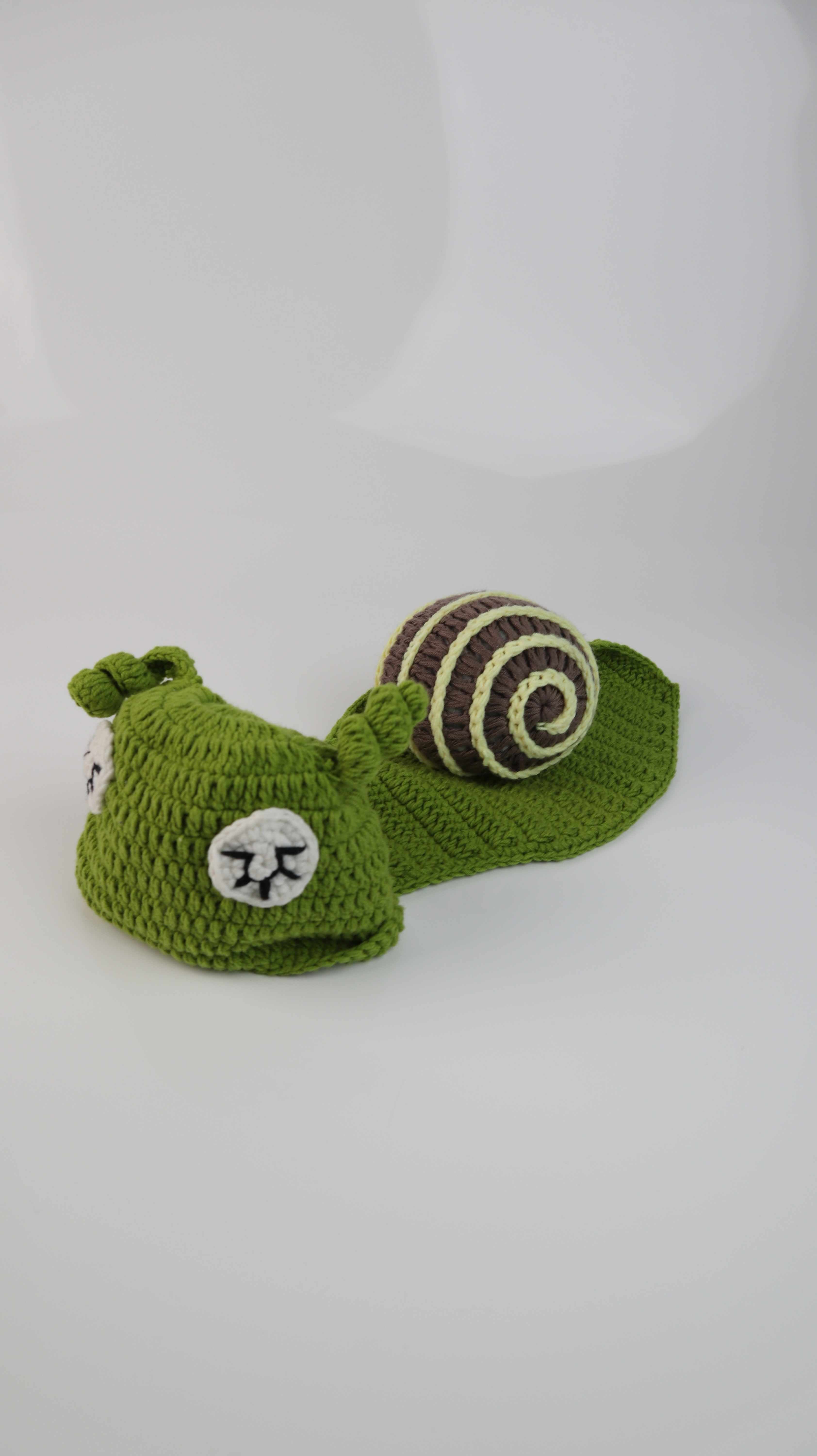 Babykostüm Schnecke Schneckenkostüm grün gehäkelt Babyfotografie
